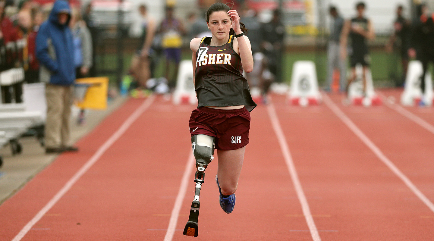 Student athlete running on the track