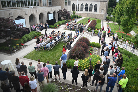 A large crowd of Fisher community members gathered in the courtyard outside the President's Office.