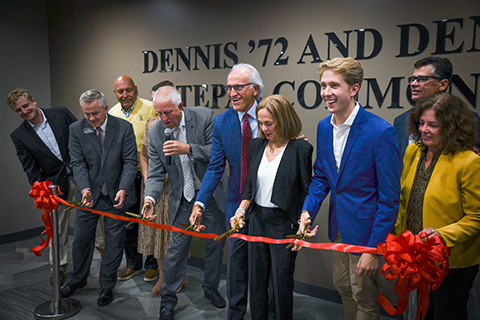 A ribbon-cutting ceremony is held for the Dennis '72 and Denise Tepas Commons